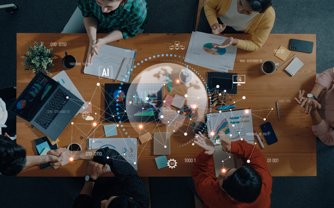 Top-down view of a diverse team around a wooden table: charts, laptops, notebooks, and graphs with an AI data overlay (world map).